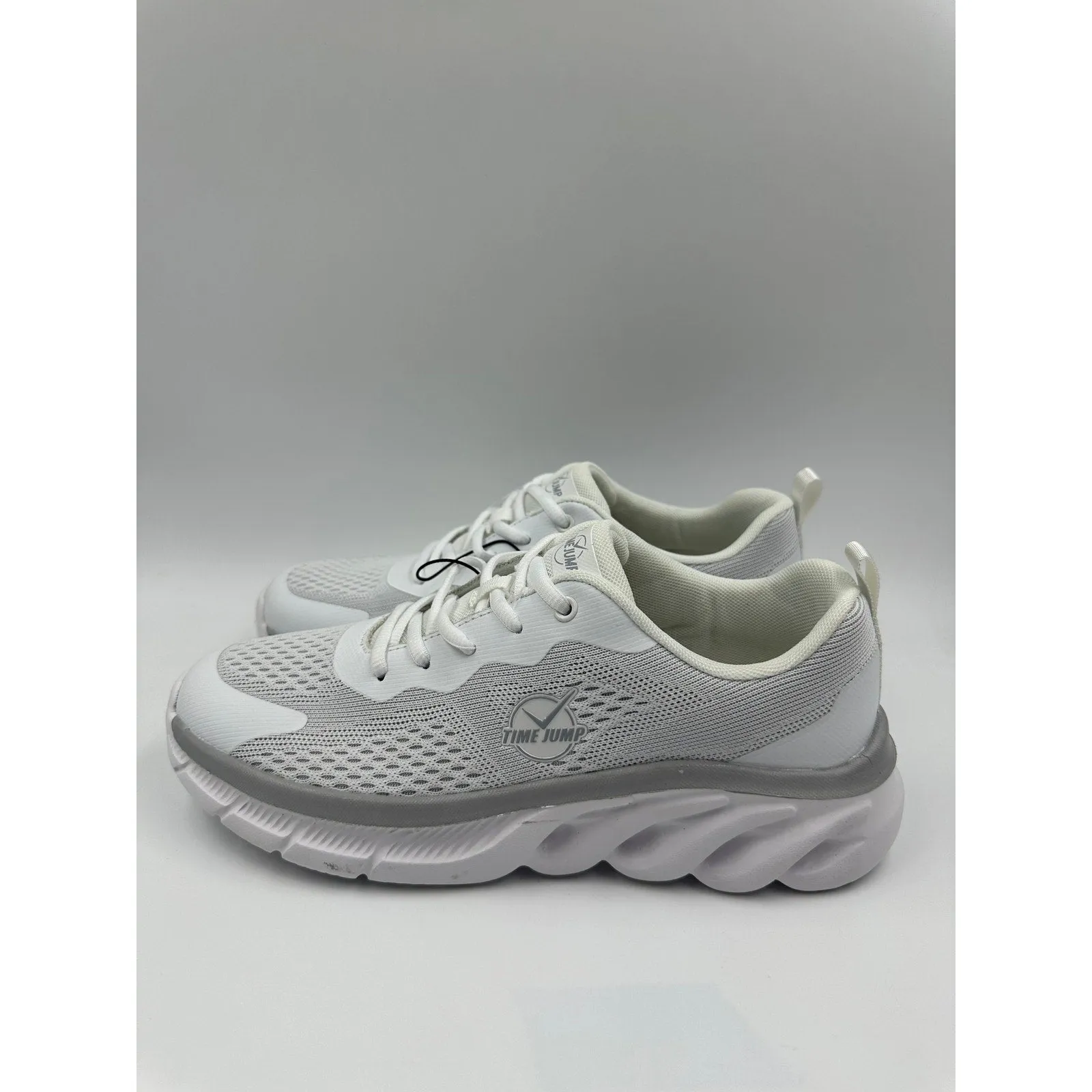 Men's Size 9.5 White Low Top Running Sneakers with Gray Accents